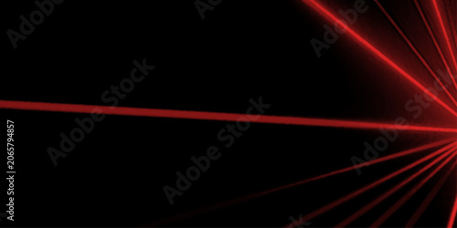 Abstract red laser beams radiating outward from a central point on a dark background. Red light beams radiate from a central point on a dark background. Red Glow Star Bright Flash Light Beam Radiant.