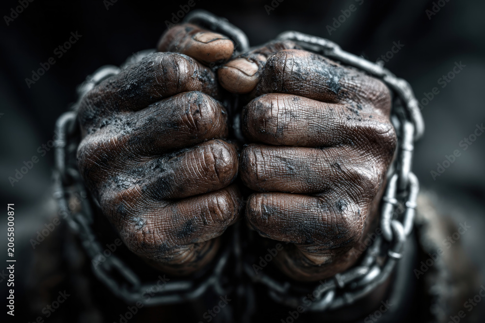 Fototapeta premium Chained Hands Close Up Concept of Slavery Oppression and Human Rights Abuse