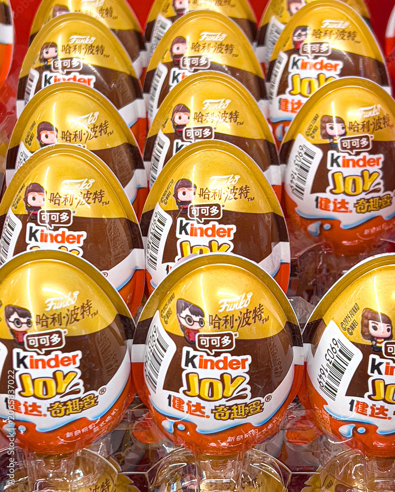 Naklejka premium Kinder joy harry potter funko surprise eggs displaying in retail store