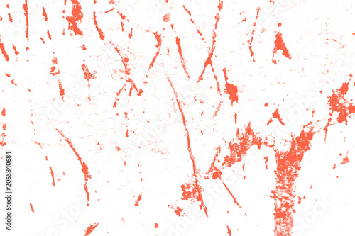 Red paint splatters on a white background with streaks and smudges