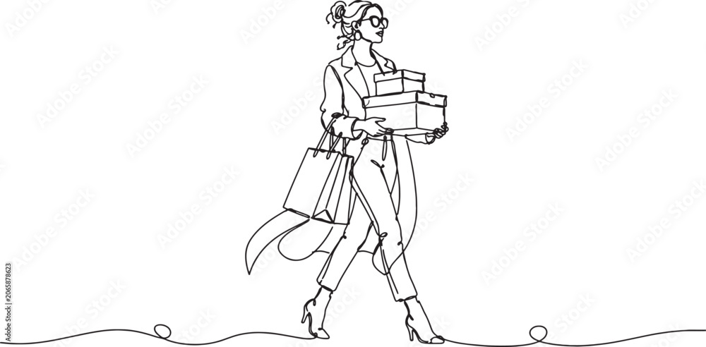 Fototapeta premium Woman carrying shopping bags and boxes walking alone
