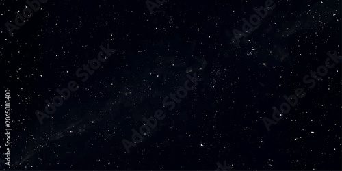 Foto A vast expanse of the night sky, teeming with countless twinkling stars and nebulae, invites contemplation of the universe's grandeur and mystery