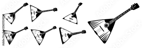Foto Balalaika folk musical instruments in various positions in vintage woodcut style