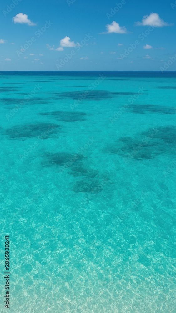 Fototapeta premium Serene turquoise ocean view mobile wallpaper