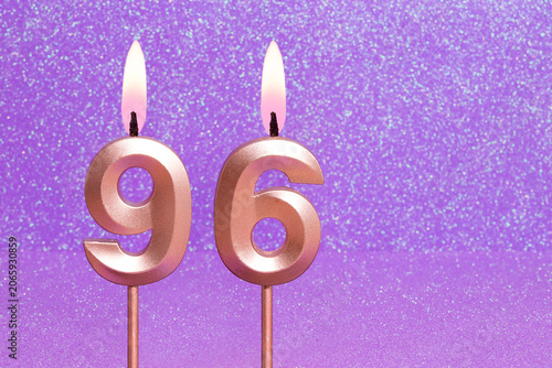 Number 96 on a pink background with blurred bright dots - Birthday or anniversary card with abstract blurred dots that glow