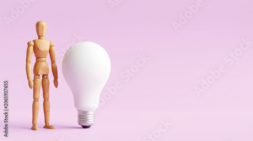 Business growth analysis strategy innovation and employee evaluation breakthrough concept with wooden mannequin standing next to light bulb with copy space for kpi tracking mid year performance review