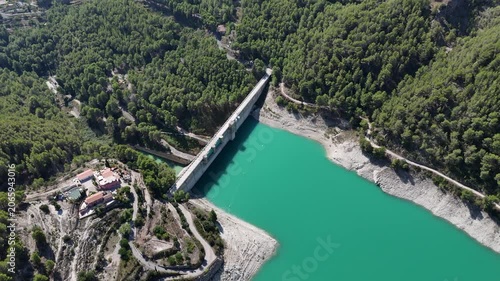 Aerial View of Dam and Reservoir in Forest Mountain Landscape