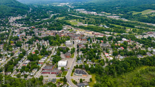 Oneonta, NY, USA - June 7, 2026: Late afternoon spring aerial photo of downtown, business district, Oneonta, NY on an overcast day.