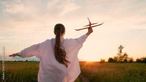 Fotografie Little girl become pilot fly, travel