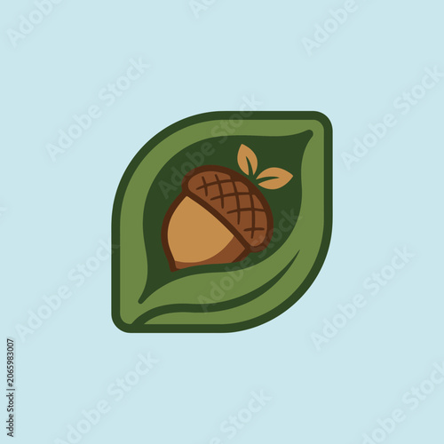 A stylized brown acorn sits inside a simple green leaf icon