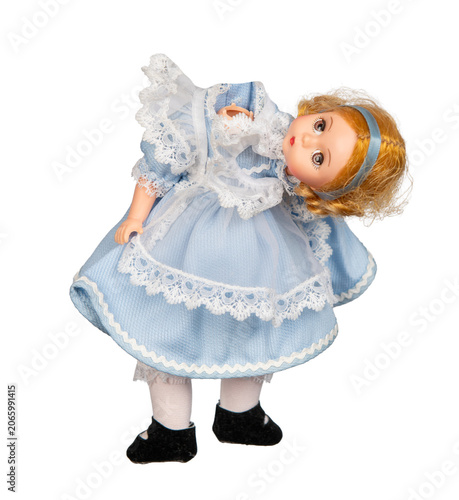 Isolated vintage doll with an unattached head