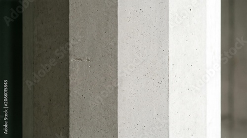 Detailed view of a textured precast concrete architectural element with light and shadow