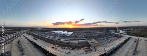 Sunset at industrial railyard