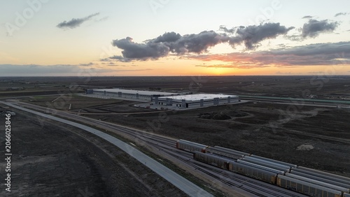 Sunset at industrial railyard