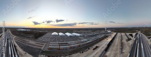 Sunset at industrial railyard