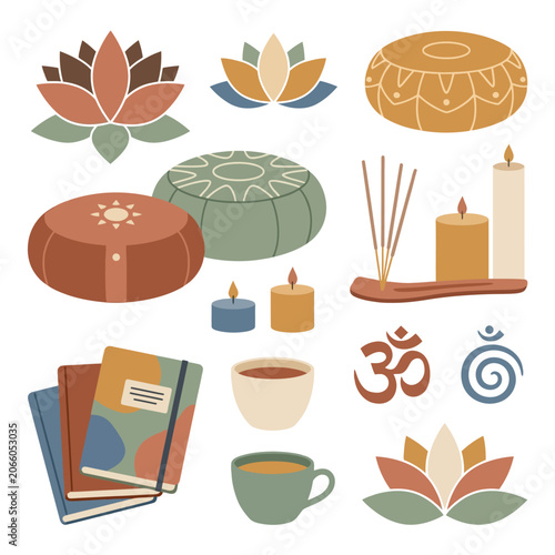 Various yoga and meditation items are arranged on a table indoors.
