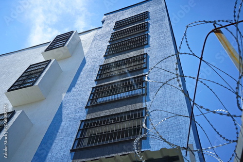 Fotografia Metal bars on the windows of the prison facility, juvenile colony