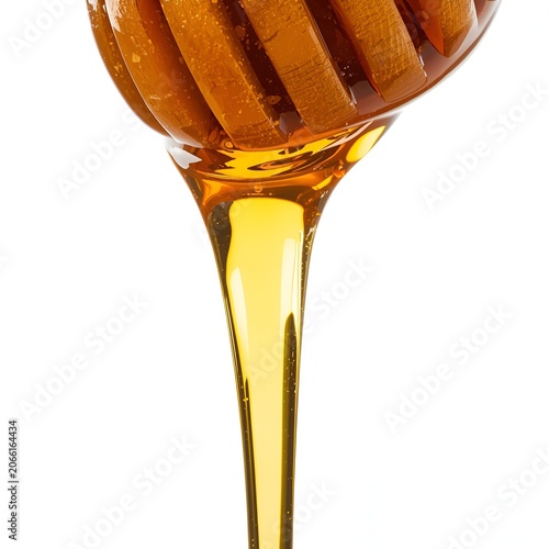 honey dripping from a wooden spoon