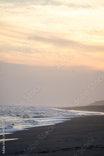 Vertical Sunset Shoreline With Ocean Surf