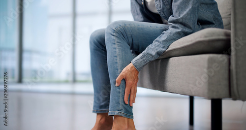 Obraz na plátně Mature Woman Soothes Leg Muscle Cramp Easing Swelling