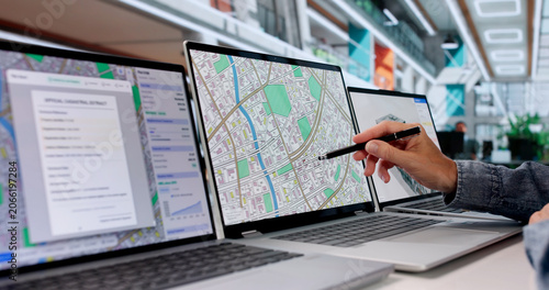 Canvastavla Experienced Urban Planner Analyzes City Maps And Land Data