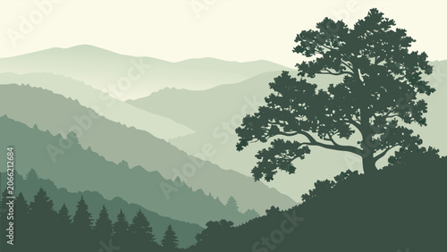 Silhouette of a lone oak tree on a hillside with layered green mountains in the background in a serene, atmospheric landscape for nature backgrounds.