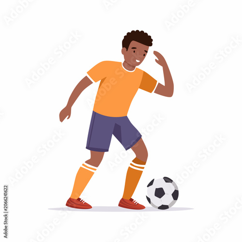 Young male soccer player dribbling a ball