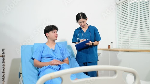 atient reviewing and signing medical consent documents with healthcare staff during hospital registration, consultation, treatment preparation