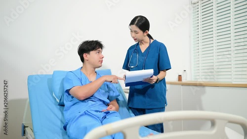 atient reviewing and signing medical consent documents with healthcare staff during hospital registration, consultation, treatment preparation
