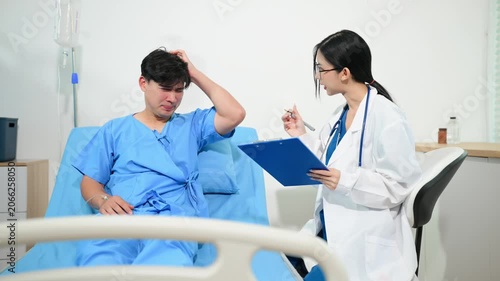 atient reviewing and signing medical consent documents with healthcare staff during hospital registration, consultation, treatment preparation