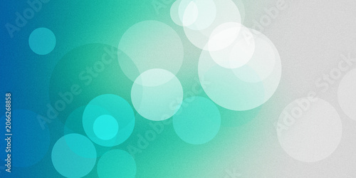 Fotografie Abstract background with glowing white and teal bokeh circles floating over gradient texture for creative design projects