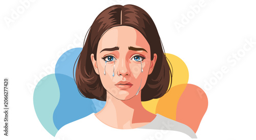 Heartbreaking close-up portrait of a young woman with blue eyes crying, with visible tears streaming down her face.