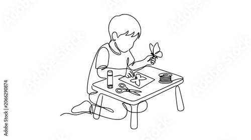 Foto Child crafting butterfly art, drawing, scissors, glue, and thread on table, sing