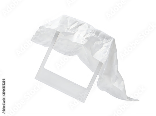White Polaroid photo frame with crumpled paper on top isolated on transparent background transparent background