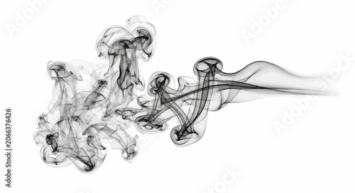 Swirling smoke tendrils dance in mid-air