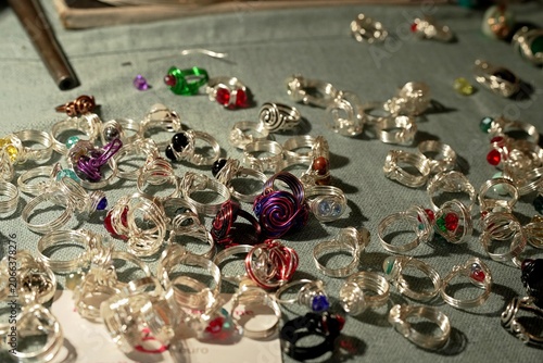Handcrafted silver rings and jewelry.
A close-up of beautiful handmade silver rings.