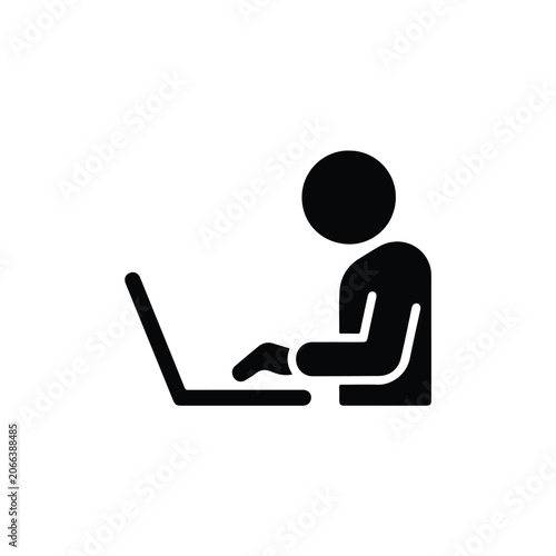 Black silhouette icon of a person working on a laptop for business and remote work