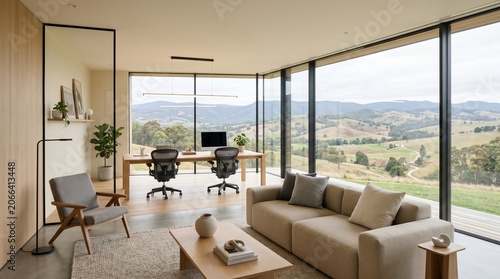 Modern home office and living area with panoramic mountain landscape view