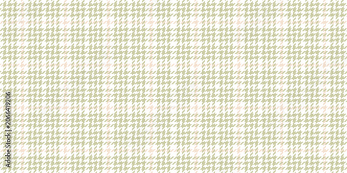 Fotografie A seamless jacquard fabric for suits and dresses with a subtle olive houndstooth pattern complemented by a delicate pink checkered pattern on a white background