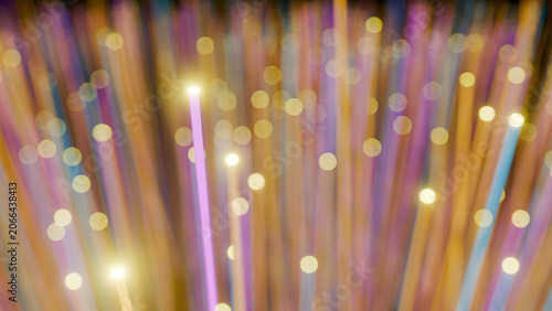 Colorful fiber optic light trails with bokeh effect (3D Rendering)