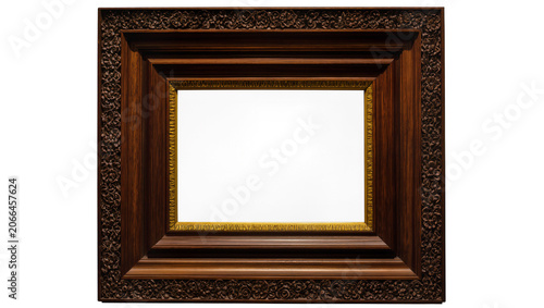 Canvas Print Isolated ornate dark wood picture frame with carved floral details and golden in