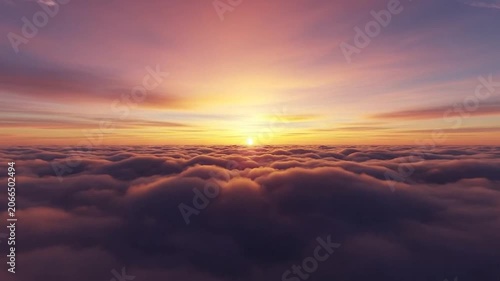Beautiful golden sunset over a vast sea of fluffy clouds in the sky