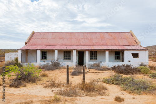 Abandoned, derelict old colonial farmstead in arid region