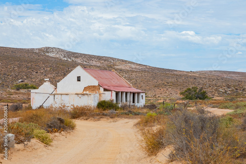 Abandoned, derelict old colonial farmstead in arid region