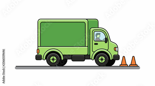A green delivery truck with a box-like body and two orange cones