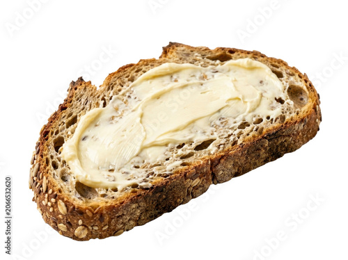 A slice of whole grain bread with melted butter on a white background