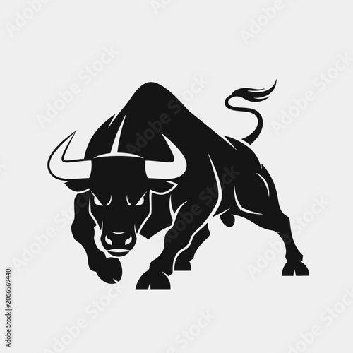 фотографія Bold black silhouette of a charging buffalo with curved horns