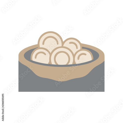 Bowl of round white food items.