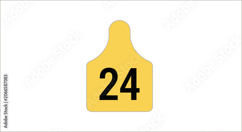 Yellow cattle ear tag with number twenty-four