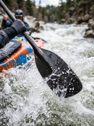 Kayaker paddling through rapids with water splashing around  